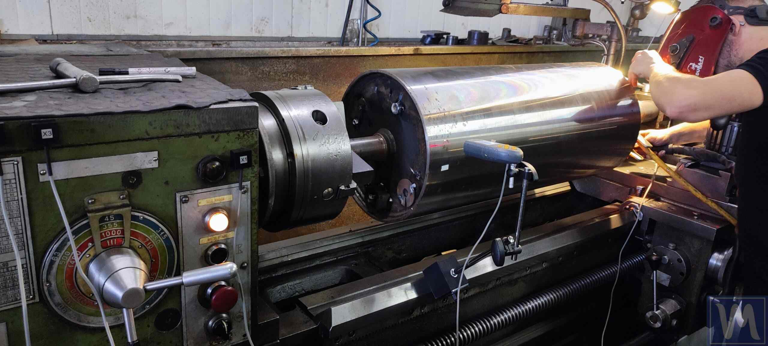 Balancing a crankshaft on a lathe to improve performance in the automotive sector.